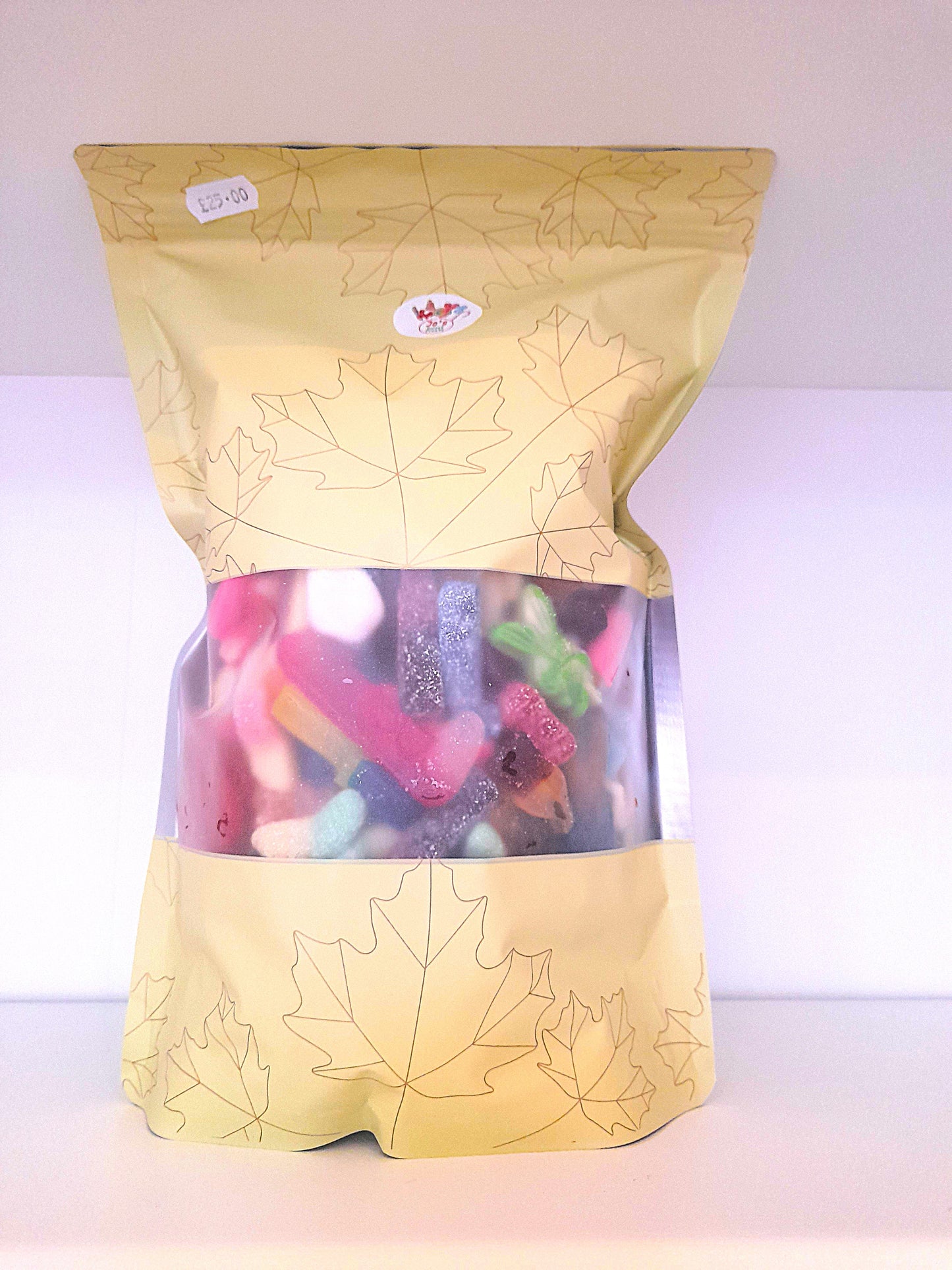 A bag of Pick and Mix candy assortment, with visible colorful candies inside the transparent packaging.