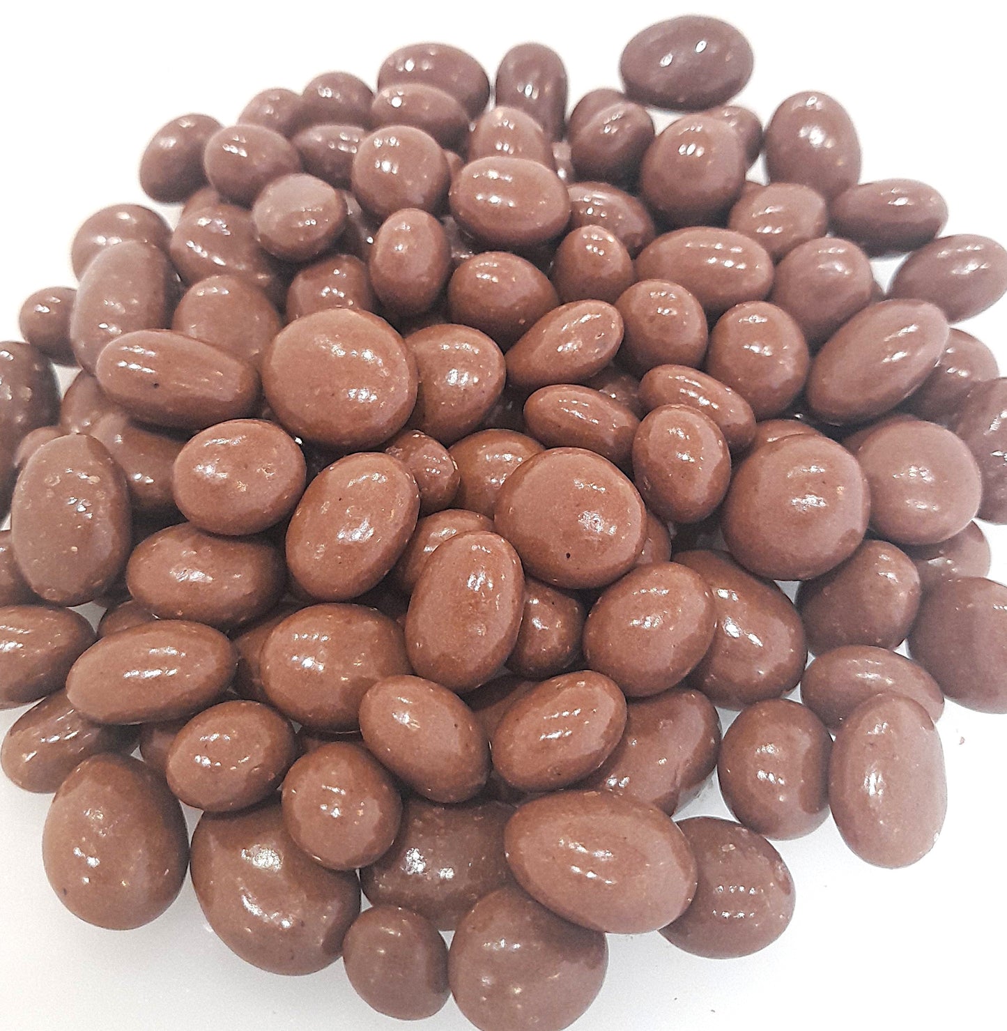 A bowl of chocolate covered raisins.