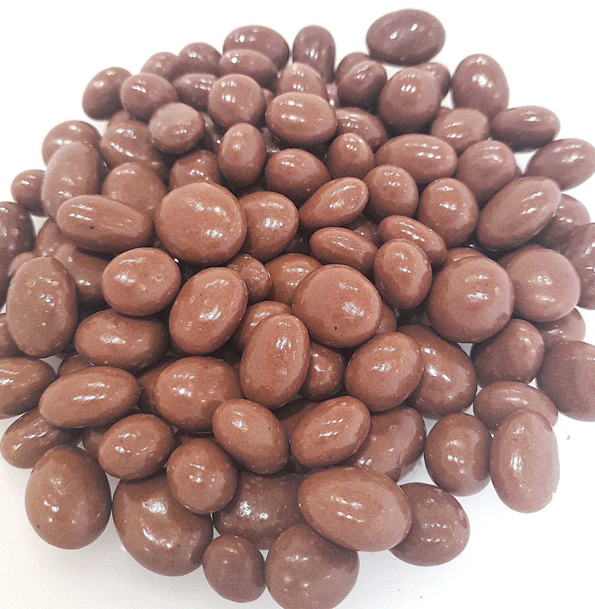 A bowl of chocolate covered raisins.