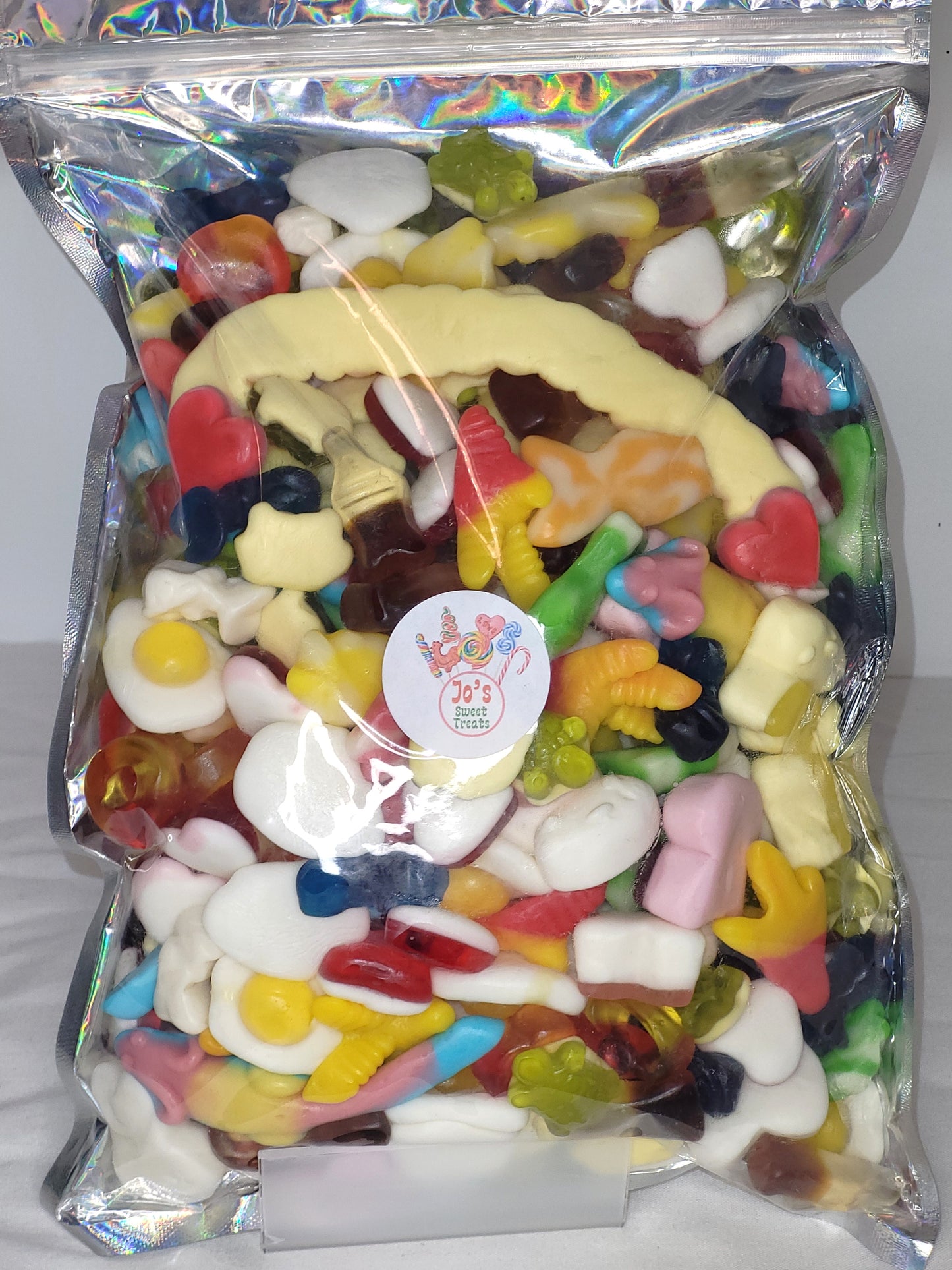 Bag of assorted colorful gummy candies with a visible brand label.