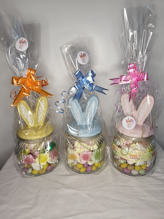 Easter themed glass jars with bunny ears.